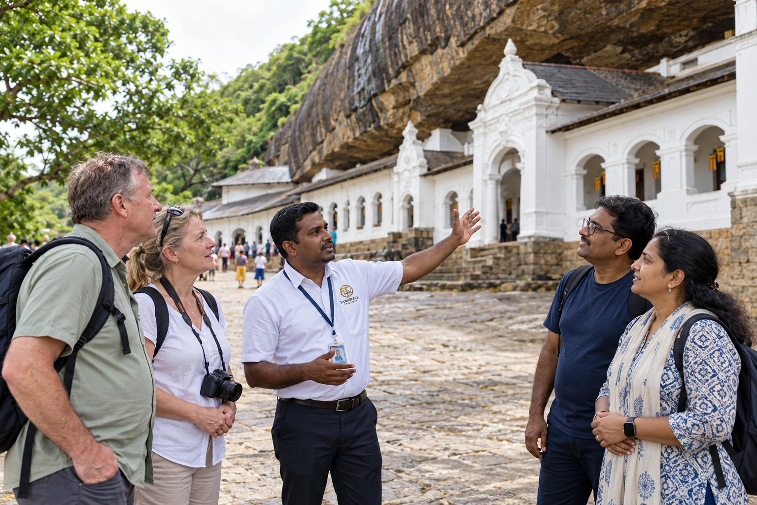 Guide with guests at the Dambulla cave temple